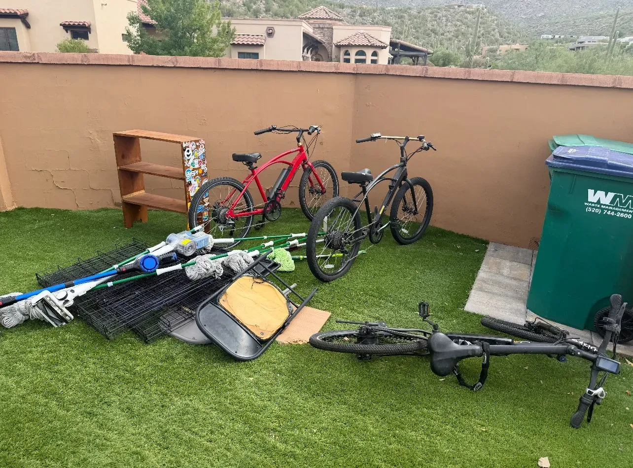 Bikes and tools on green grass